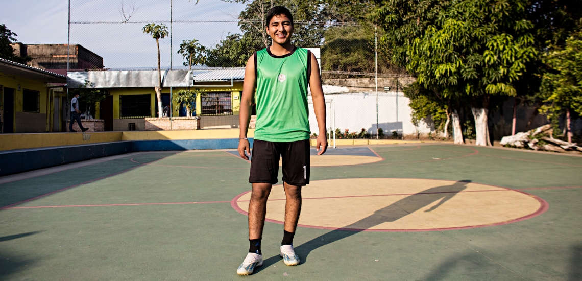 Andres - junger Mann mit grünem Fußballtrikot