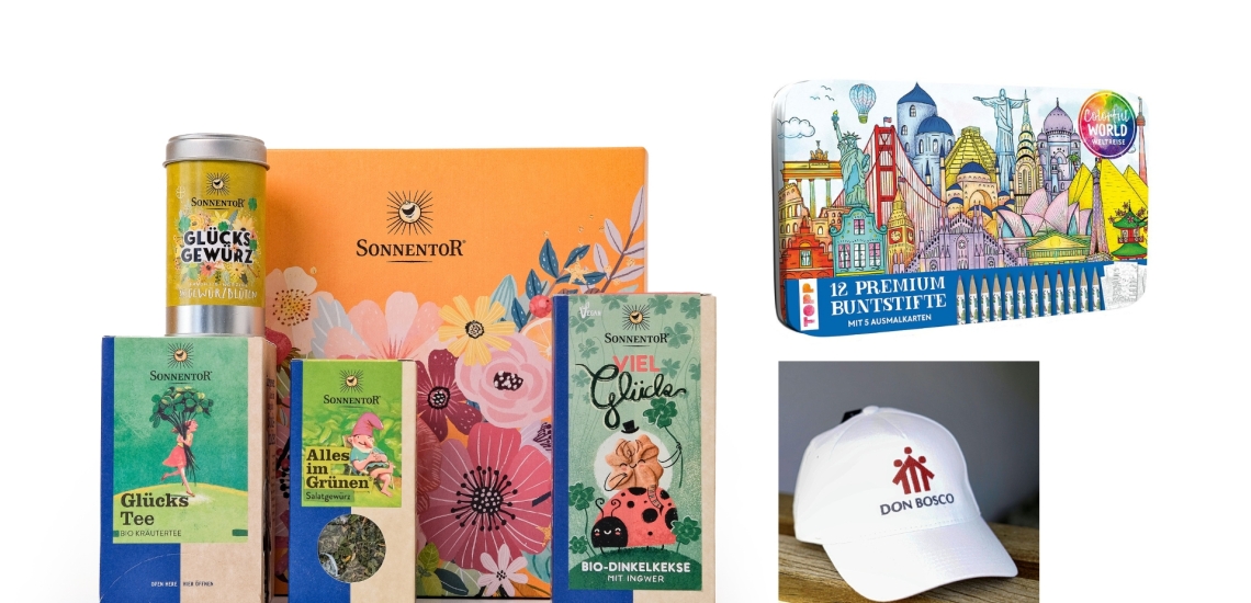 Lebensmittel aus Glücksbox, Buntstifte-Packung und Kappe mit Don Bosco Logo