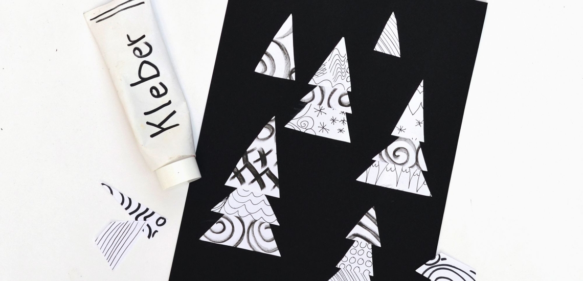 Kleber und gemusterte Tannenbäume 