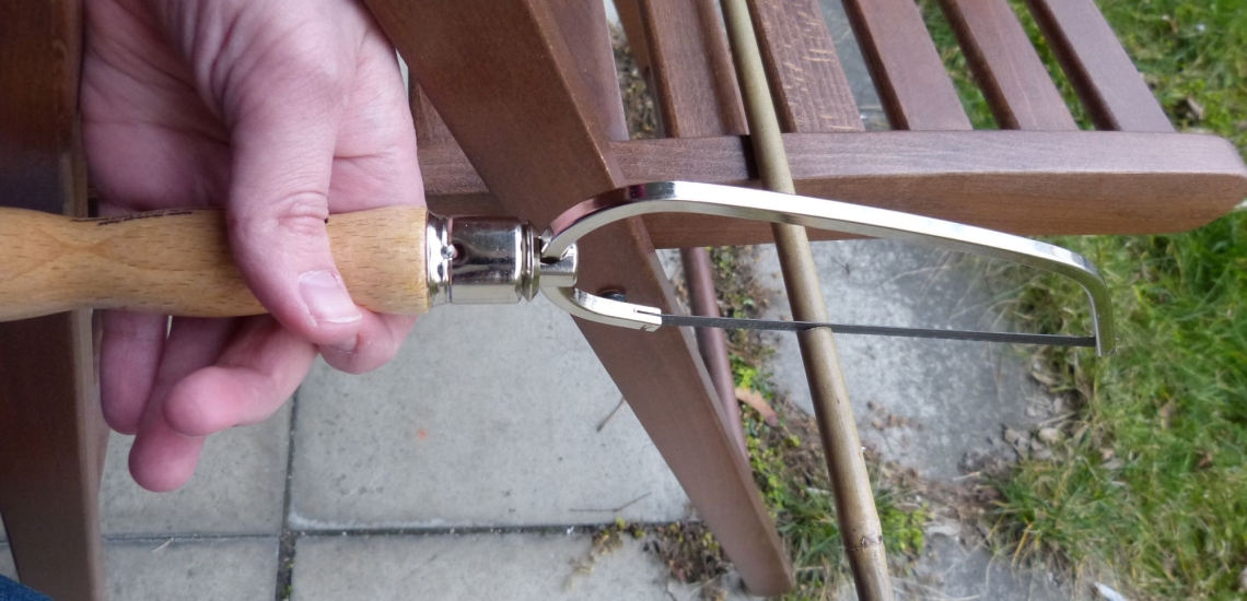 Stab mit Säge abschneiden 