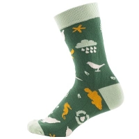 Grüne Socken mit gelben und weißen Tieren