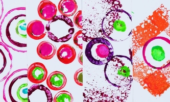 auf Papier gedruckte Kreise in Pink, Lila, Hellgrün und Orange